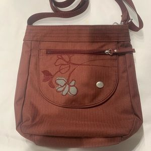 Haiku jaunt RFID blocking travel crossbody bag